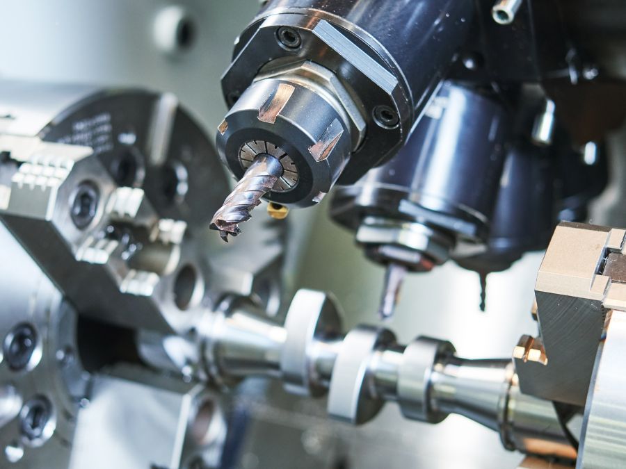 Engineer checking metal sheet laser cutting with digital verniers